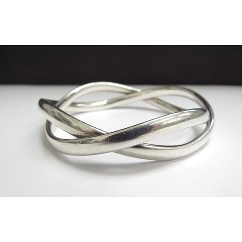 7097 - A Georg Jensen silver wavy bangle by Astrid Fog #237B, 65.3g