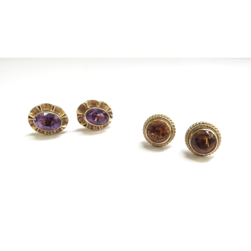 7087 - Two pairs of 9ct gold stud earrings including oval amethyst and citrine examples, 3.6g     (R) £50