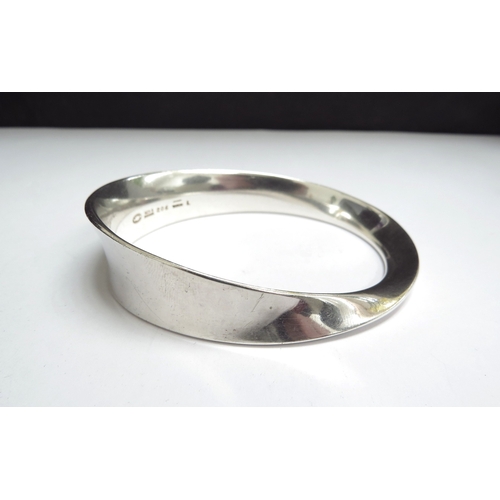 7096 - A Georg Jensen Mobius silver bangle designed by Vivianna Torun #206, 52.7g, boxed