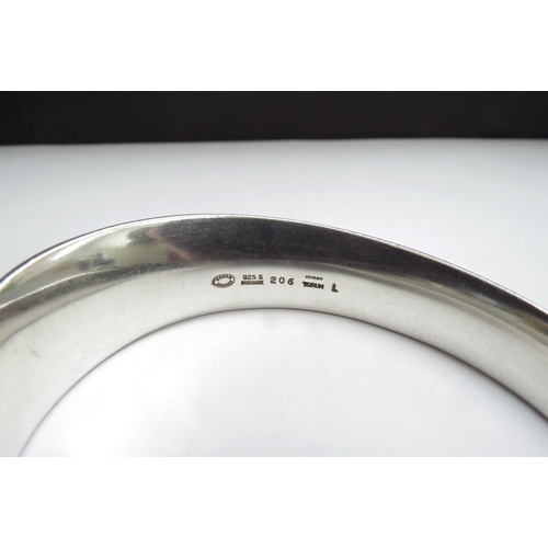 7096 - A Georg Jensen Mobius silver bangle designed by Vivianna Torun #206, 52.7g, boxed