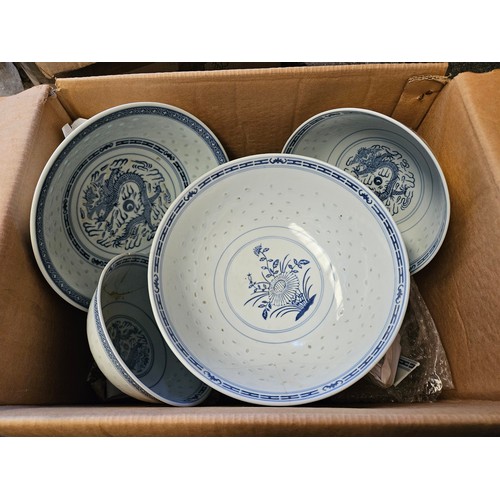 1217 - Three boxes of blue and white Chinese rice pattern dinner service, some a/f