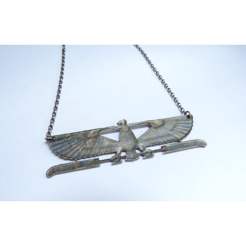 7064 - An Egyptian style enamel winged bird pendant on chain, 68cm long, stamped sterling     (C)