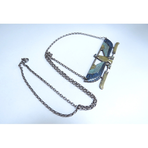 7064 - An Egyptian style enamel winged bird pendant on chain, 68cm long, stamped sterling     (C)