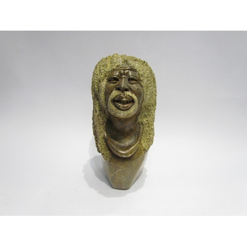 4116 - An African carved stone bust of gent, 22cm tall  (GROUP)  4115  £25-30