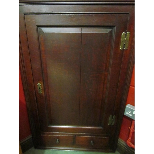 4126 - A George III oak single door corner cupboard with two base drawers, 122cm tall x 76cm wide x 41cm de... 