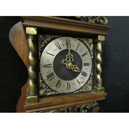 4180 - A reproduction Dutch wall hanging clock with weights and pendulum