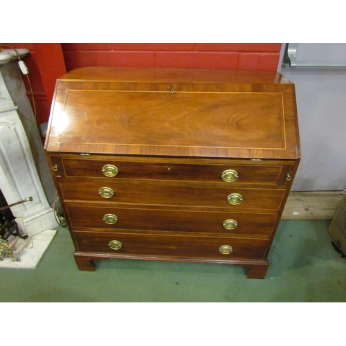 4189 - A late George III flame mahogany bureau with 