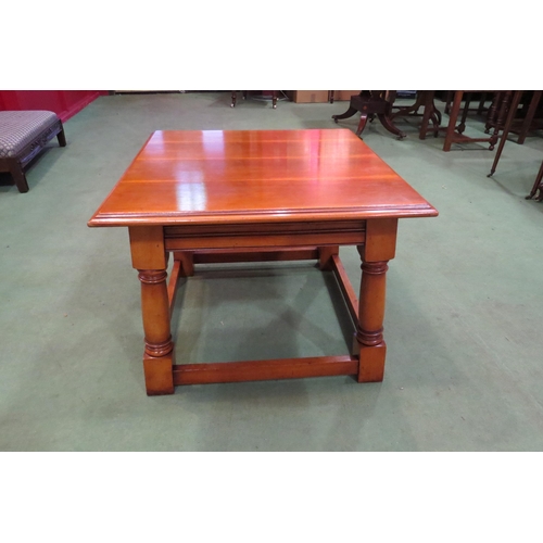 4203 - A Georgian style yew wood occasional/lamp table on turned and square legs united by stretchers, 47cm... 