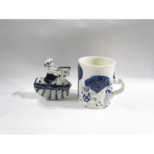 4526 - A Wilfred Gibson, Cornwall Pottery mug and child on rocking horse