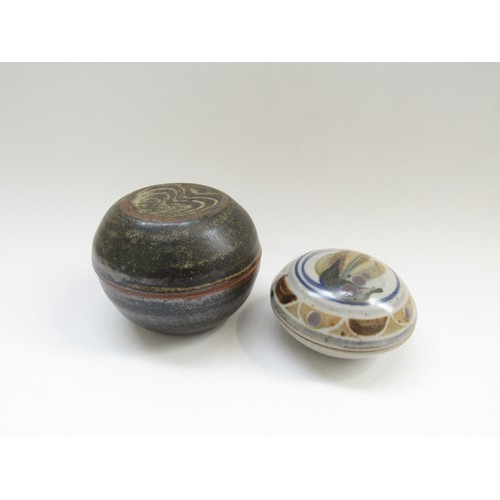 4316 - Two studio pottery lidded circular boxes with impressed potters seals. Largest 9.5 cm diameter x 7cm... 