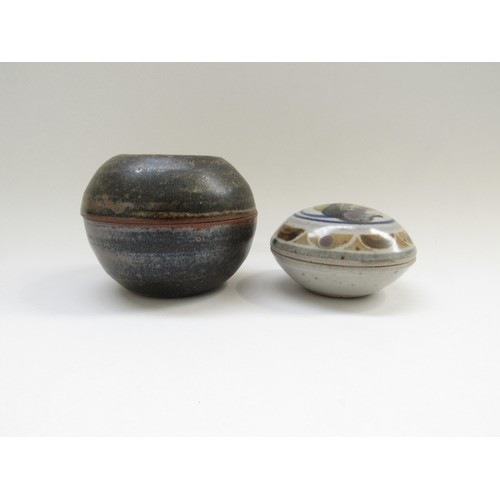 4316 - Two studio pottery lidded circular boxes with impressed potters seals. Largest 9.5 cm diameter x 7cm... 