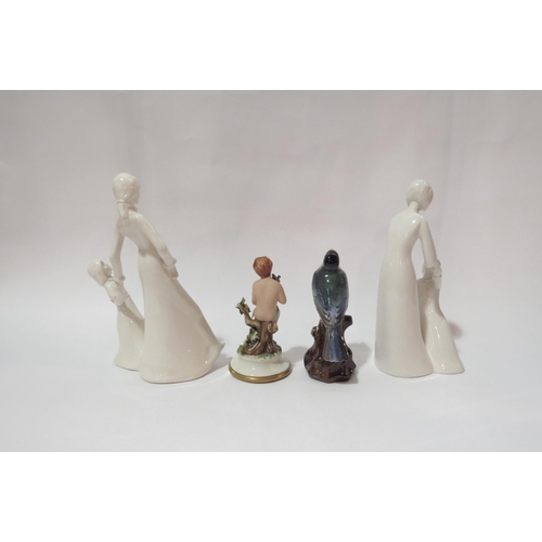 4328 - A Tuscan China finch on tree stump 13cm tall, a Nao bisque figure of cherub and two 