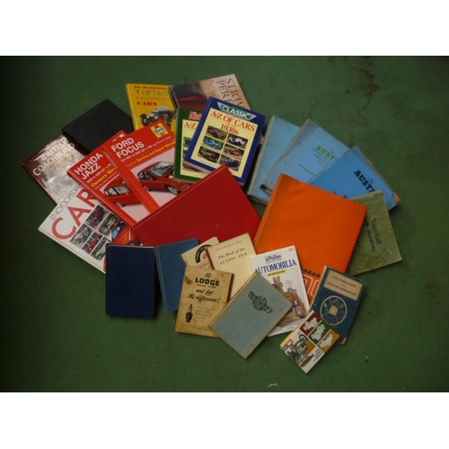 6092 - A box of books and manuals including Haynes, Encyclopaedia of cars and Austin manuals on the A40, Ca... 