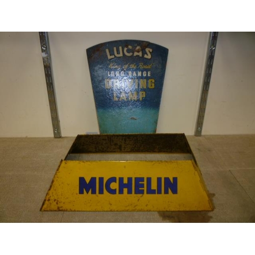 6115 - A Lucas 'King of the Road' long range driving lamp advertising board a/f 39cm tall along with a tin ... 