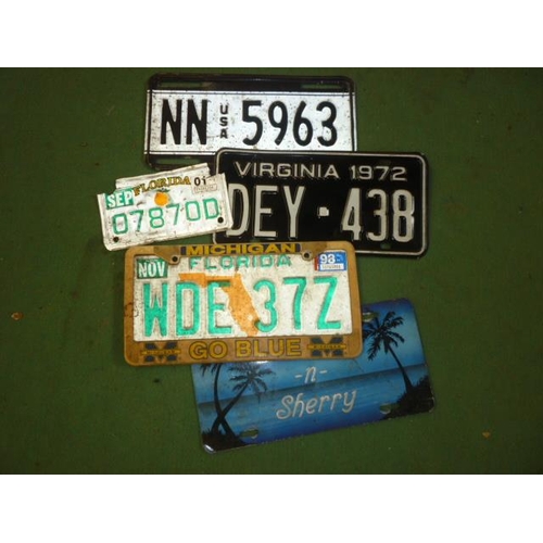 6134 - Four modern pressed tin American licence plates