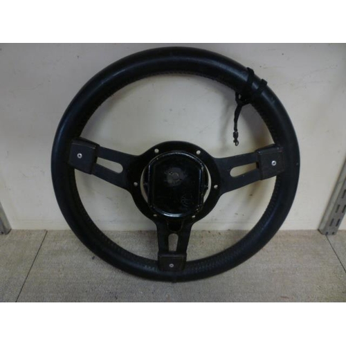 6148 - A Smith's motoring clock set in a Mountney steering wheel