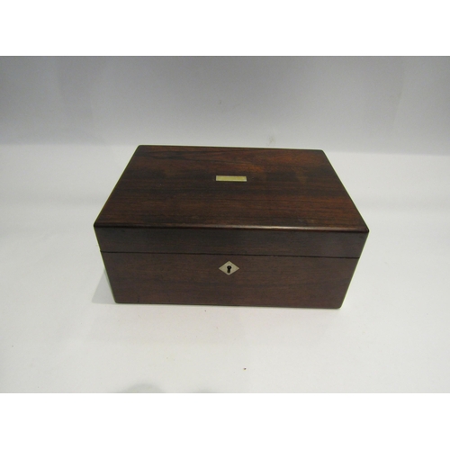 4228 - A rosewood sewing/jewellery box, contents to include mother-of-pearl reel, shells, buttons, etc