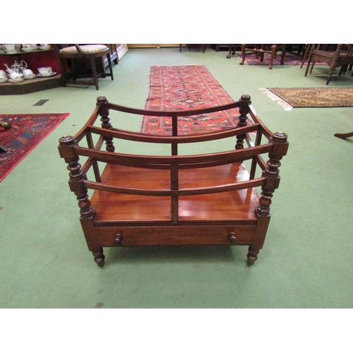 4241 - A Circa 1850 early Victorian mahogany two division Canterbury on turned and square supports, the sin... 