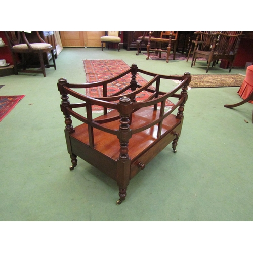 4241 - A Circa 1850 early Victorian mahogany two division Canterbury on turned and square supports, the sin... 