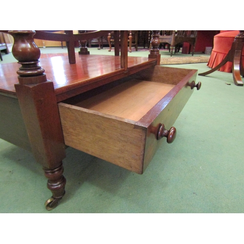 4241 - A Circa 1850 early Victorian mahogany two division Canterbury on turned and square supports, the sin... 