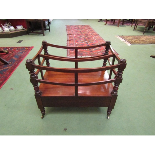 4241 - A Circa 1850 early Victorian mahogany two division Canterbury on turned and square supports, the sin... 