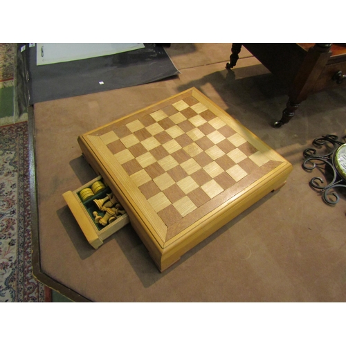 4245 - A wooden chess set and board