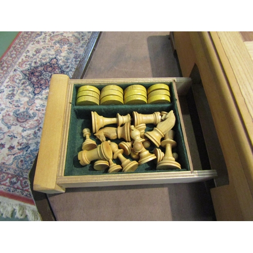 4245 - A wooden chess set and board