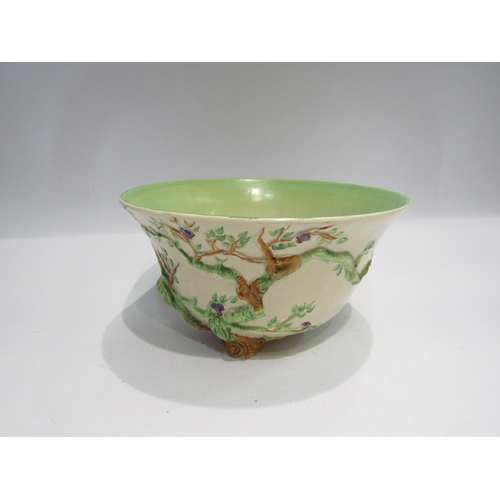 4246 - A Clarice Cliff bowl with applied floral detailing, 15cm tall