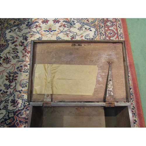 4261 - An oak box, brass escutcheon, plinth base, (lid loose) 34cm long x 22cm wide x 14cm deep     (R) £30