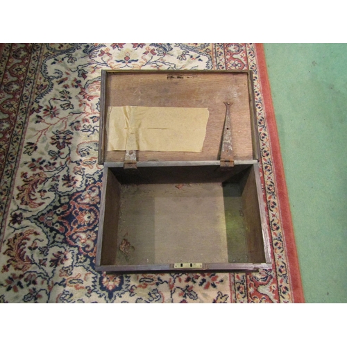 4261 - An oak box, brass escutcheon, plinth base, (lid loose) 34cm long x 22cm wide x 14cm deep     (R) £30