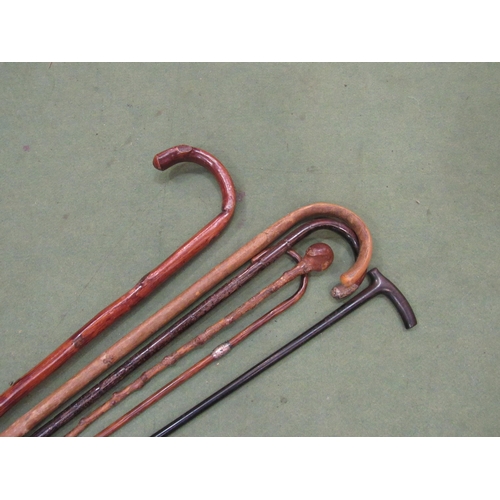 4013 - A selection of walking canes for adults and children including silver banded and knopped (6)