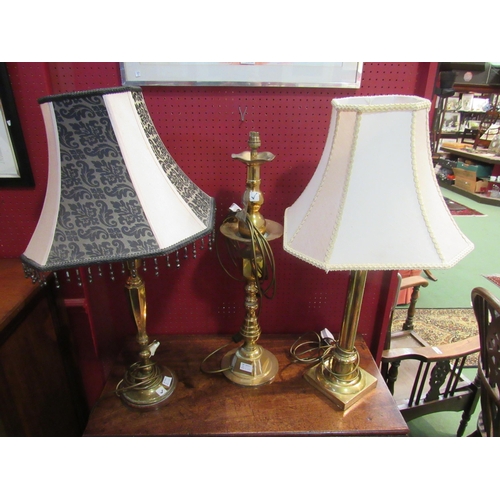 4064 - Three brass table lamps including column and twisted form stems