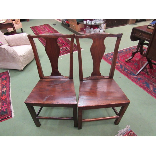 4072 - Circa 1800 a pair of elm and fruitwood East Anglian chairs, the vase shape central splat backrest ov... 