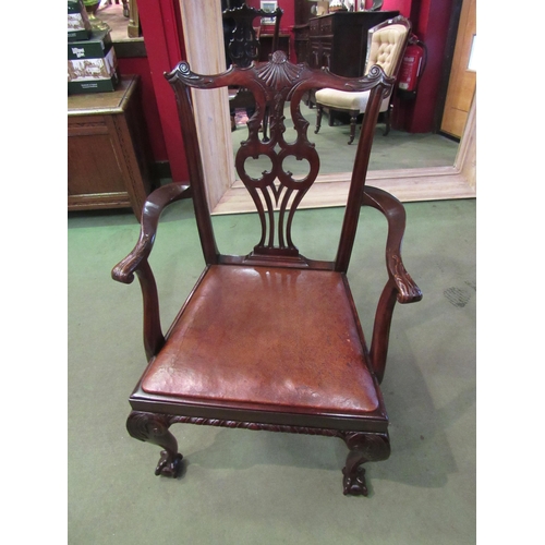 4073 - A Georgian mahogany Chippendale design armchair with carved acanthus leaf and fan decoration, the fr... 