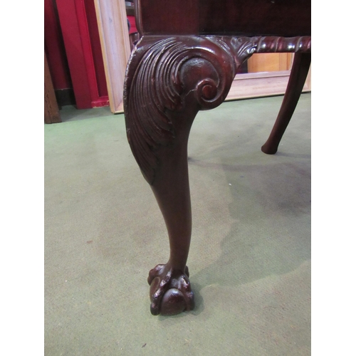 4073 - A Georgian mahogany Chippendale design armchair with carved acanthus leaf and fan decoration, the fr... 