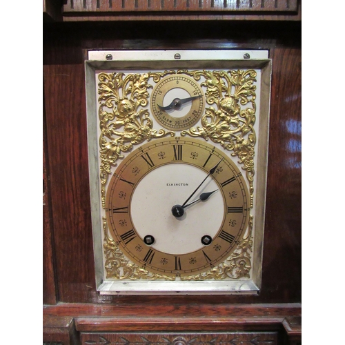 4097 - A Mahogany Elkington & Co. bracket clock, carved case and column form front, ornate decoration to fa... 