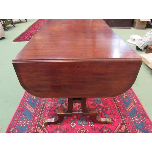 4108 - A Regency flame mahogany country house sofa table with black line inlay, the rising leaves over two ... 