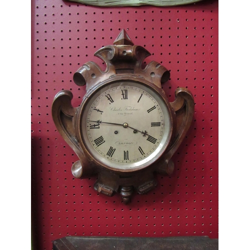 4124 - A Charles Fredsham, London, carved oak wall clock with Roman numeral dial, with key