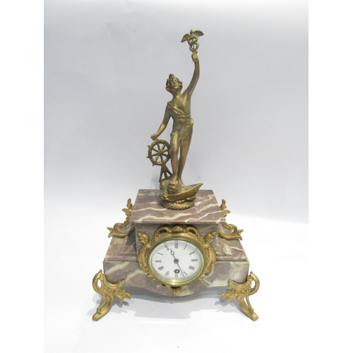 4179 - A French marble mantel clock surmounted by an ormolu figure, 45.5cm high