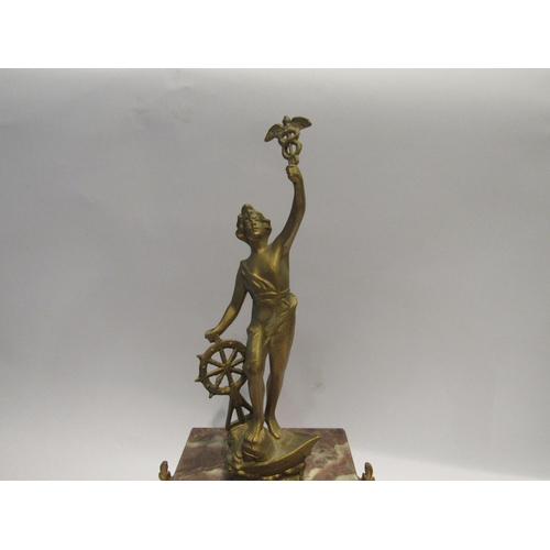 4179 - A French marble mantel clock surmounted by an ormolu figure, 45.5cm high