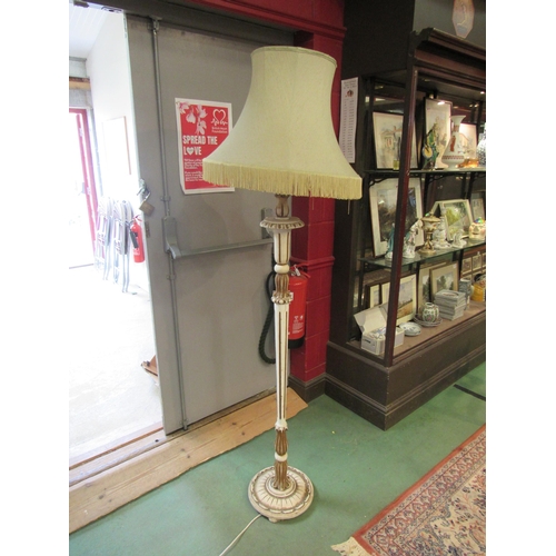 4185 - A carved and white painted lamp standard with shade