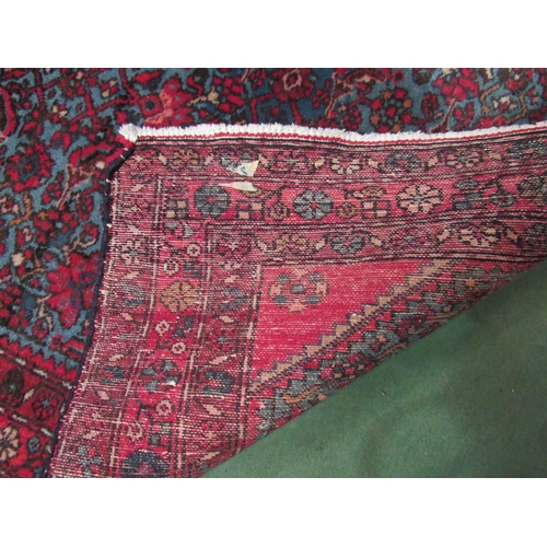 4198 - A Persian blue ground runner rug, allover foliate design, multiple red borders, 200cm x 82cm