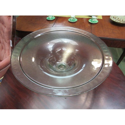 4207 - A pedestal tinted glass dish, 49cm diameter