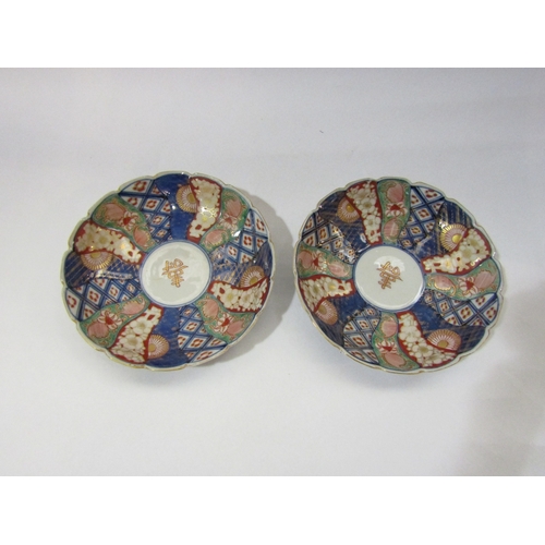 4296 - A Chinese ginger jar (no lid) together with two Imari plates