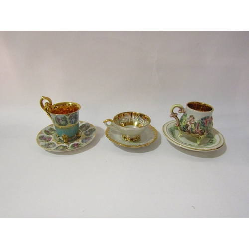 4311 - Three cabinet cups to include Capodimonte and Dresden