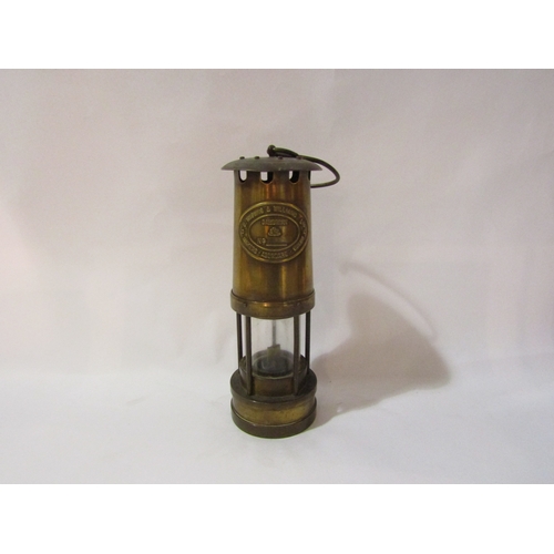 4335 - An E. Thomas & Williams Ltd brass miner's lamp