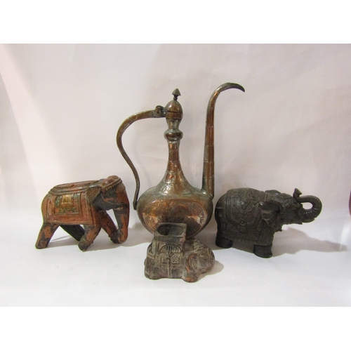 4336 - A Persian coffee pot together with various elephants, one as a candle