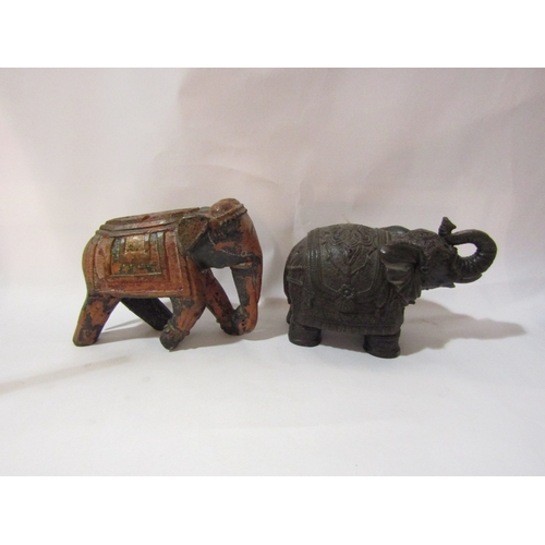 4336 - A Persian coffee pot together with various elephants, one as a candle