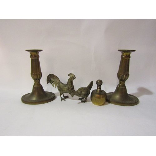 4343 - A pair of brass candlesticks, 15.5cm tall, paperweight and a plated hen with cockerel (5)