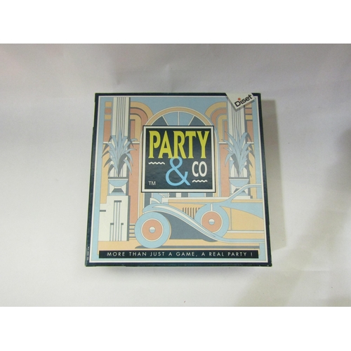 4358 - A box of 70's and later Matchbox diecast vehicles, Party & Co board game and Top Trumps the Animal K... 